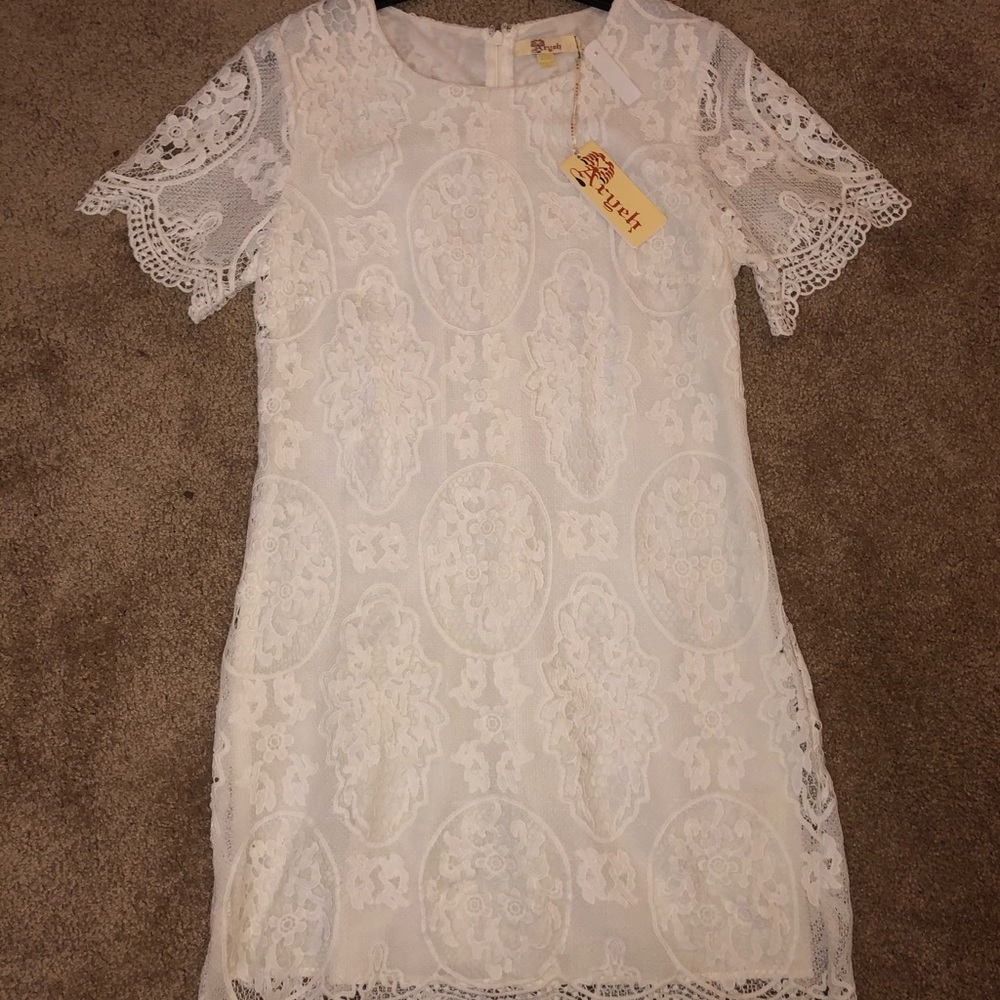 Brand new off White lace Aryeh Dress.